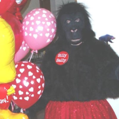 Silly giving a singing telegram in a full-length gorilla costume!